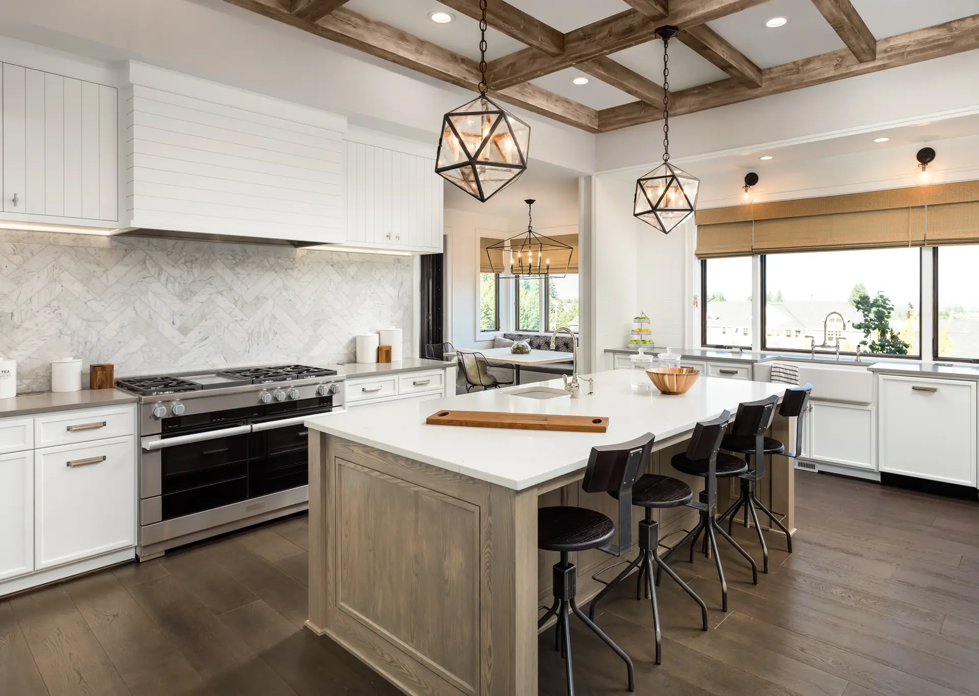 Luxury Manhattan Beach kitchen remodel with custom island, hardwood floors, modern cabinetry, and elegant coastal design.